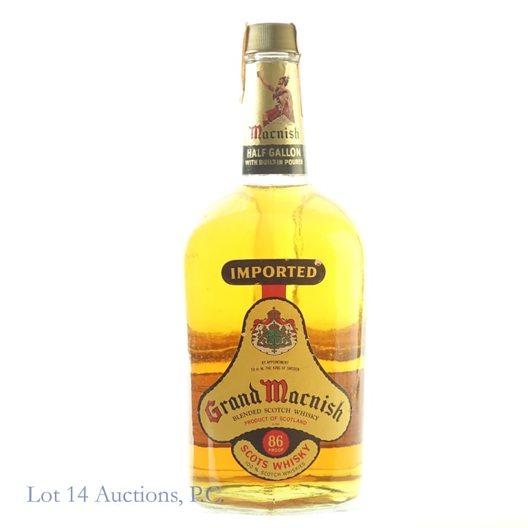 Grand Macnish Blended Scotch (1/2 Gallon): Grand Macnish Blended Scotch, 86 Proof, 1/2 Gallon, 1960s-1970s bottlings. Slight wear and tear on tax strip but remains sealed and intact overall. Small tears on front label.