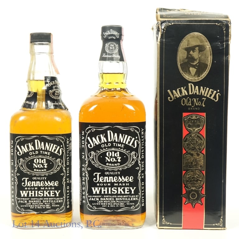 Jack Daniel's Tennessee Whiskey (750 ml, 1 Liter): 1-Jack Daniel's Tennessee Whiskey, 90 Proof, 1 Liter. Gold Medal Louisiana Purchase Exposition Box included. Box suffers from severe moisture damage around top edges. 2-Jack Daniel's Tennessee Whiskey