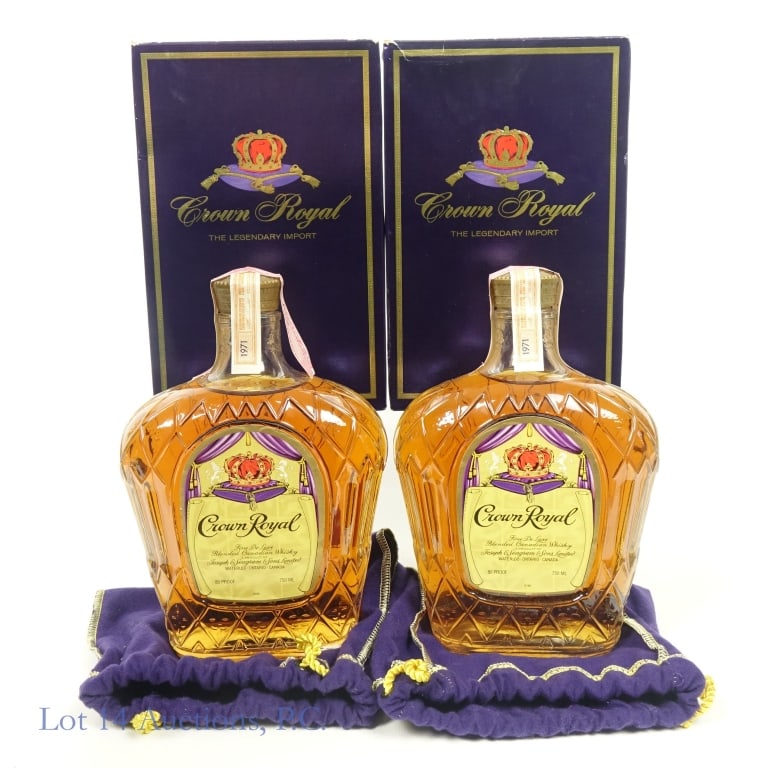 1971 Crown Royal De Luxe Canadian Whisky (2): Crown Royal Fine De Luxe Blended Canadian Whisky, 80 Proof, 750 ml, Distilled: 1971 (x2). Back label peeling on one bottle with loose tax strip. Boxes and bags included for both bottles. Small tear in