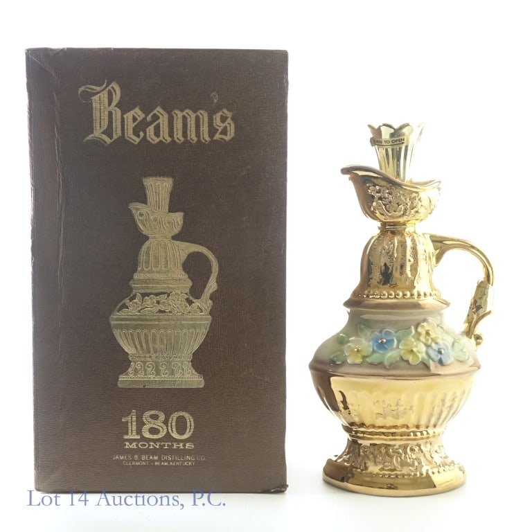 1976 Beam 180 Month Bourbon China Decanter***: Beam 180 Month Bourbon Decanter, 80 Proof, 4/5 Quart, Bottled: 1976, Aged: 180 Months Old. Weight of decanter is approximately 3Ib, 9 oz. Slight residue on tax strip but sealed and in good condition o