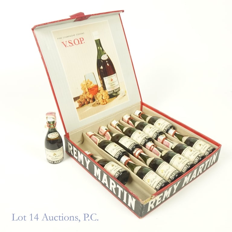 50s Remy Martin VSOP Cognac Mini Set (12)*: Remy Martin VSOP Fine Champagne Cognac Mini Set of 12, 80 Proof, 1/16 Pint. Estimated to have been bottled in the 1950s. Fill levels are good.***Rubber bands around neck of bottle holding tax strips o