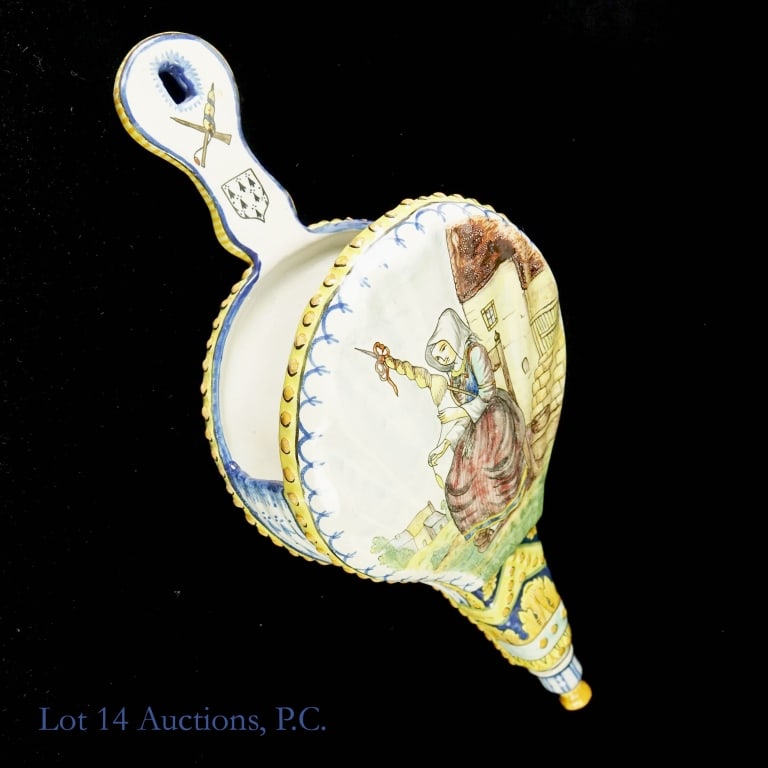 Quimper French Earthenware Wall Pocket: 19th century Quimper Faience Wall Pocket with bordered designs in classic Brittan colors of blue and gold. Center painting depicts a French woman traditionally dressed and spinning natural fibers into