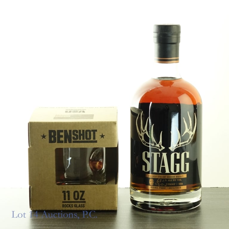 Stagg Barrel Proof Bourbon & Rocks Glass Batch 23A: Stagg Barrel Proof Bourbon (2023), 130.2 Proof, 750 ml, Batch #23A. Also includes an 11 oz hand-made rocks glass from the company Benshot out of Wisconsin. Rocks glass has a .45 ACP bullet blown into 