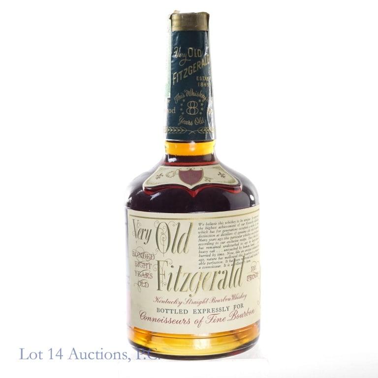 75 Very Old Fitzgerald 8 Yr Bourbon Stitzel-Weller: Very Old Fitzgerald 8 Yr Bourbon, 100 Proof, 4/5 Quart, Stitzel-Weller, Bottled: Fall 1975, Made: Fall 1967. Tax strip in very good condition, slight moisture damage and residue on back label