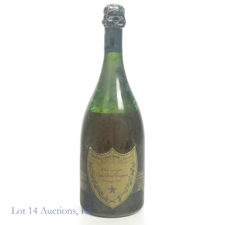 1955 Dom Perignon Champagne***: 1955 Moet et Chandon a Epernay Dom Perignon Champagne, 12.5% ABV, 750 ml, Vintage: 1955.****Low fill at about 3 3/4 inches below base of neck/bottom of foil seal. Slight wear or disintegration on foil