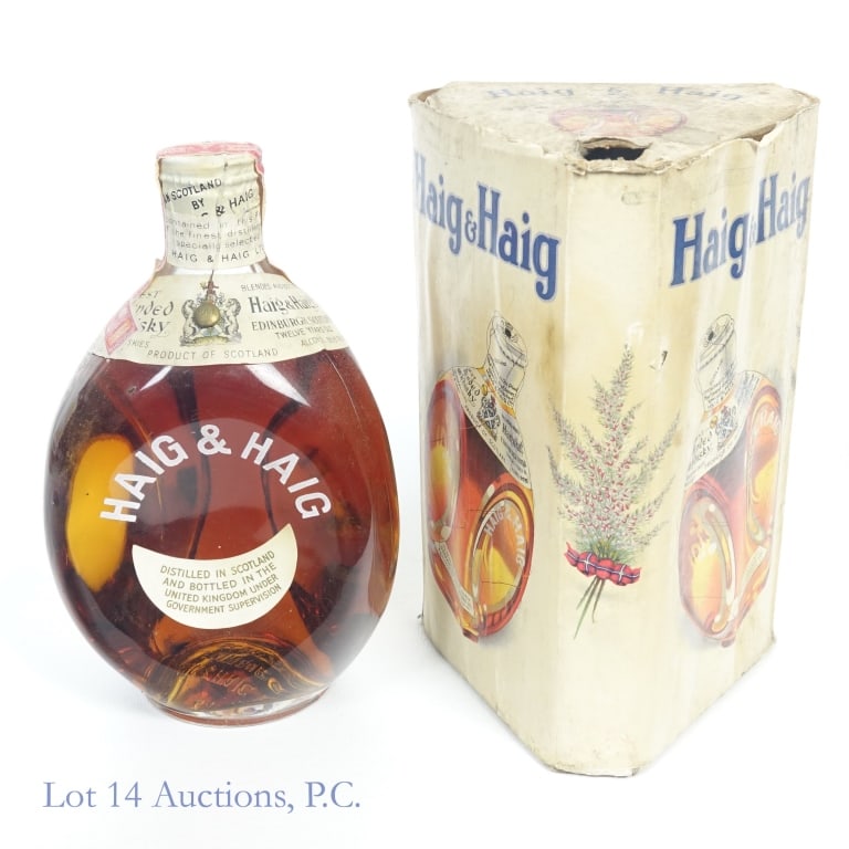 30s/40s Haig & Haig 12 Year Blended Scotch 4/5 Qt: Haig & Haig 12 Year Blended Scotch, 86.8 Proof, 4/5 Quart, 1930s-1940s bottling. Minor tearing to ends of tax strip but overall intact and in good condition. Box included, box very worn and fragile.