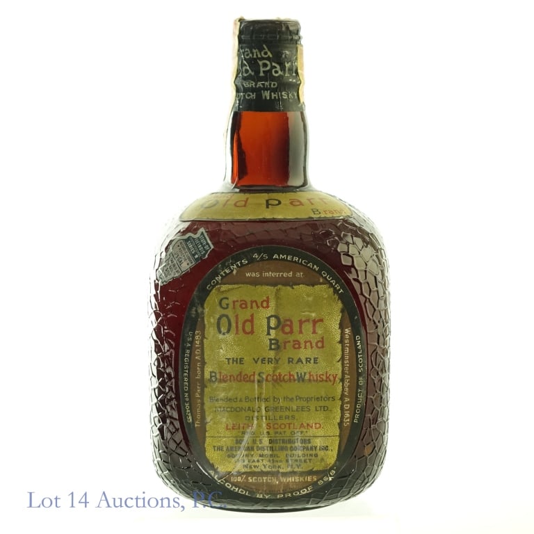 1940s/1960 Grand Old Parr Blended Scotch: Grand Old Parr Blended Scotch, 86.8 Proof, 4/5 Quart. 1940s-1960 bottling. Tax strip completely torn through on one side. Other side remains intact but has minor tears and staining. Front label discol