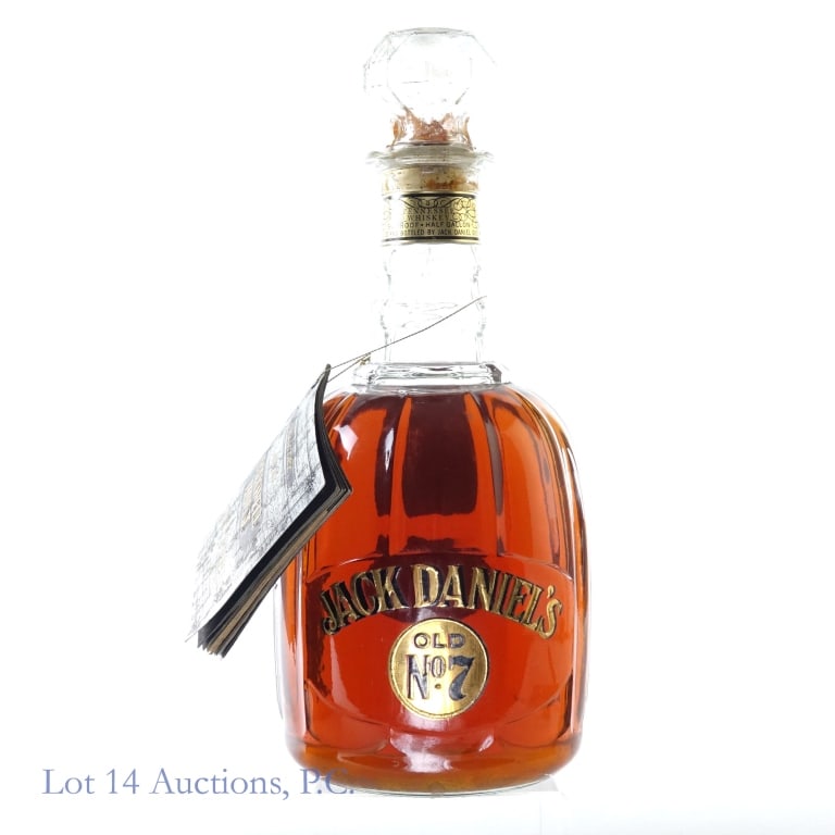 Jack Daniel's Maxwell House Whiskey (1/2 Gallon)**: Jack Daniel's Old No. 7 Tennessee Whiskey Maxwell House Bottle, 90 Proof, 1/2 Gallon, Aged: 5 Years, Bottle number difficult to discern but begins with H77.****Tax strip is broken and stained, was wra
