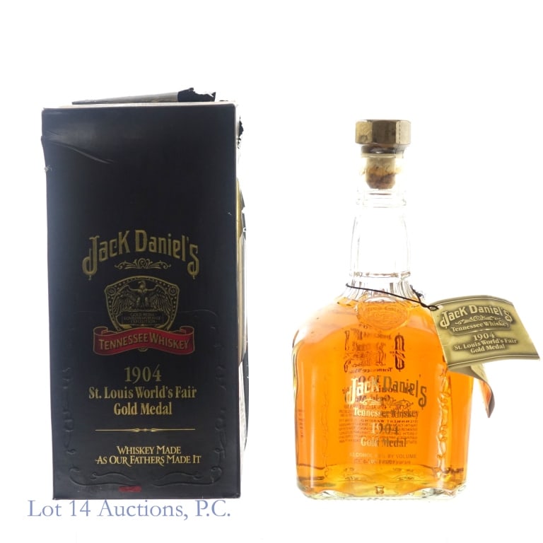 Jack Daniel's 1904 Gold Medal Tennessee Whiskey: Jack Daniel's 1904 Gold Medal St. Louis World's Fair Tennessee Whiskey, 90 Proof, 750 ml, Bottle #B183787. Original box included, box very worn and peeling, with multiple surface tears on the sides, b