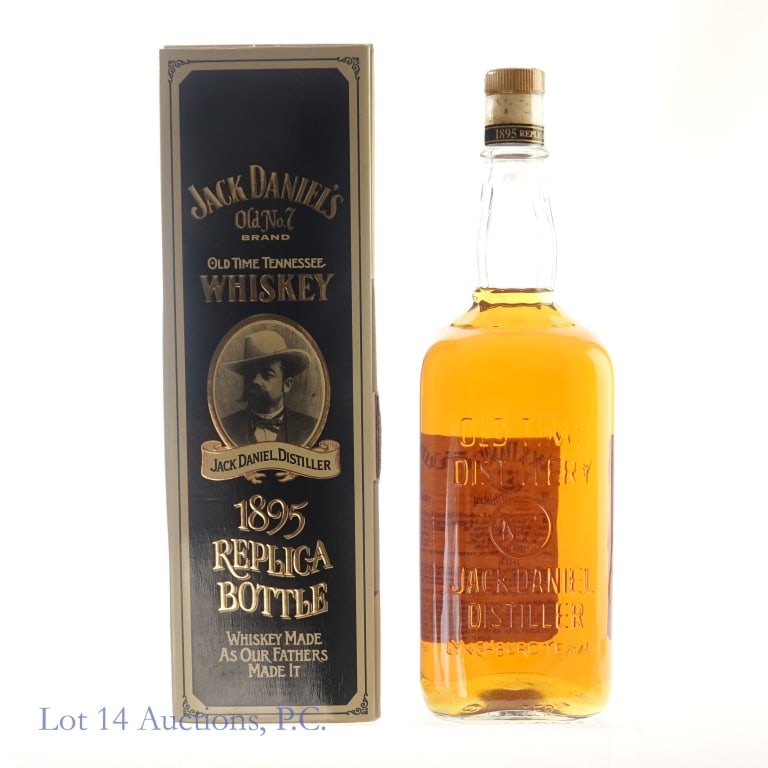 Jack Daniel's Whiskey 1895 Replica Bottle (1 L): Jack Daniel's 1895 Replica Bottle Tennessee Whiskey, 86 Proof, 1 Liter, Original box included, slight peeling on the upper edge of box.