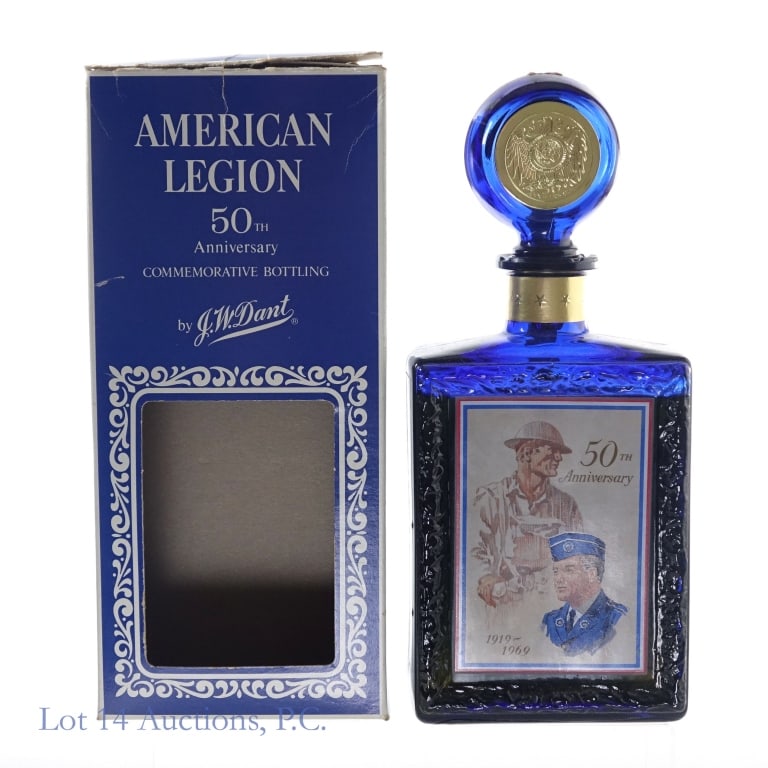 1969 J.W. Dant 50th Ann. American Legion Decanter: J.W. Dant 50th Anniversary 1919-1969 American Legion Decanter, 86 Proof, 4/5 Quart, Aged: 10 Years, slight scuff on side label. Tax strip in very good condition with little to no tearing. Fill approxi