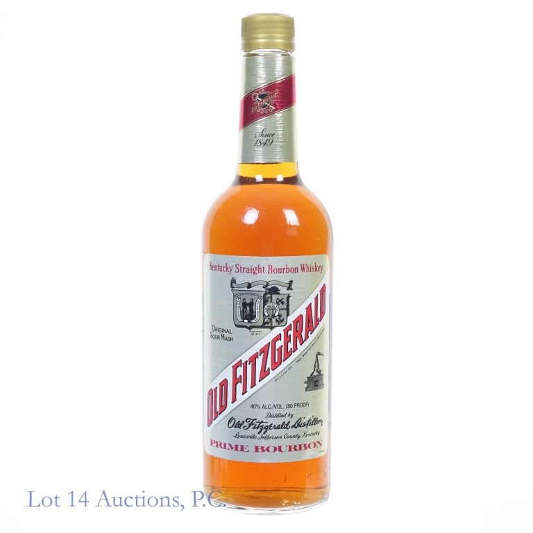 Old Fitzgerald Prime Bourbon: Old Fitzgerald Prime Bourbon, 80 Proof, 750 ml, per consignor bottle is late 1980s-early 1990s bottling, however there is a "15" glass molding and "15" laser code. Aged: 36 Months. Label is sun faded/