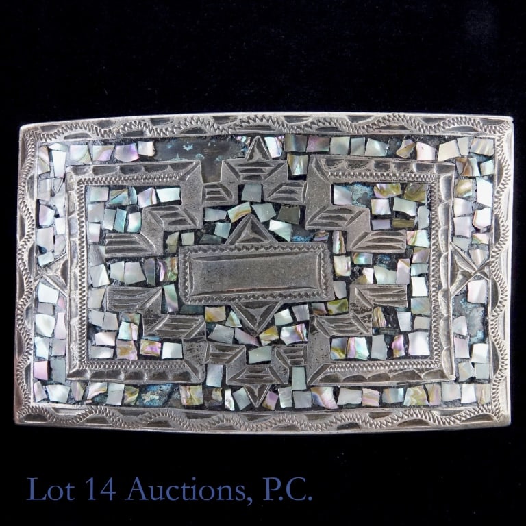 Sterling Silver Belt Buckle: Sterling Silver Belt Buckle. A Sterling silver belt buckle made in Mexico. Some decorative pieces missing on face of buckle. Please see photos for more detail.