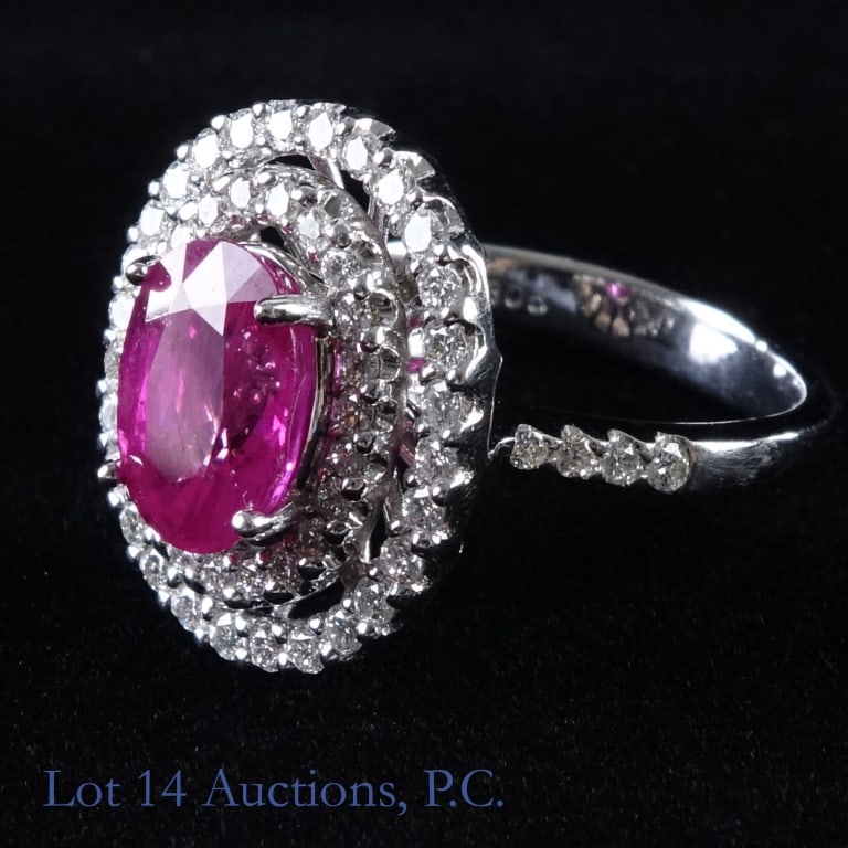 18k White Gold Diamond Ring (sz 6): 18 karat white gold (marked 750) ring with central red stone (tests as ruby in our shop) surrounded by two rings of diamonds (tested in shop). Size 8. Total weight: 7.1 grams. Central stone is approxi