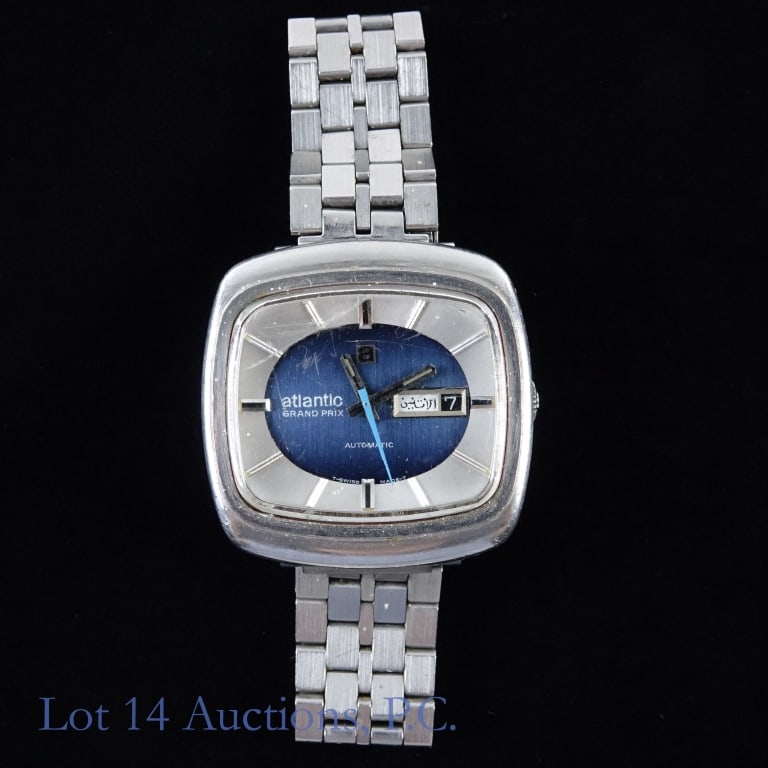 Atlantic Grand Prix Model Men's Auto Wristwatch: Atlantic Watch of Switzerland Grand Prix model automatic men's watch. Works. Serial No. 8306380. Case is 4.0 cm x 4.0 cm. Total weight: 98.5 grams. Stainless steel wristband (made in Hong Kong - we th