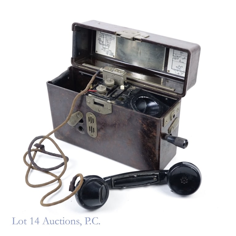 WWII German Field Telephone (Feldfernsprecher 33): German World War II Feldfernsprecher 33 (field telephone. Marked 1939. Bakelite case. cord into headset has been repaired, and electrical tape is holding the ear piece onto the body of the handset. Ma