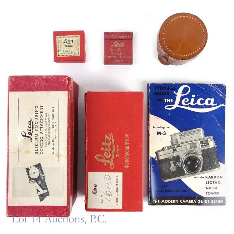 Leica Leitz Filters, Attachments (6): Leica Leitz Filters, Attachments (6). Included: Leica sliding focusing copying attachment in original box. Leica synchronblitzer in original box. Tydings Guide to the Leica softcover book. E. Leitz We