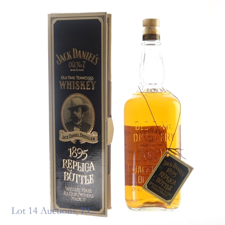 Jack Daniel's Whiskey 1895 Replica Bottle Sgnd 1L: Jack Daniel's 1895 Replica Bottle Tennessee Whiskey, 86 Proof, 1 Liter, Original box included. Box signed by Master Distiller Jimmy Bedford, 2004, slight peeling/fading on edges of box .