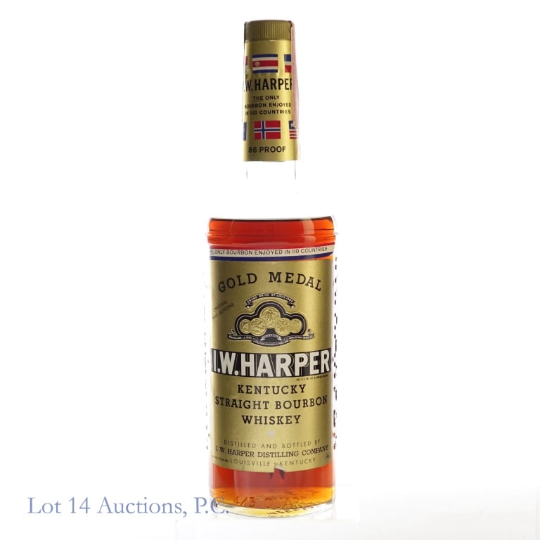 1960s I.W. Harper 6 Year Gold Medal Bourbon: I.W. Harper 6 Year Gold Medal Bourbon, 86 Proof, 4/5 Quart, early 1960s-late 1970s tax strip, "66" glass molding, Vintage label found in 1968 Bourbon Beverage Bar magazine ad. Small tear on bottom of