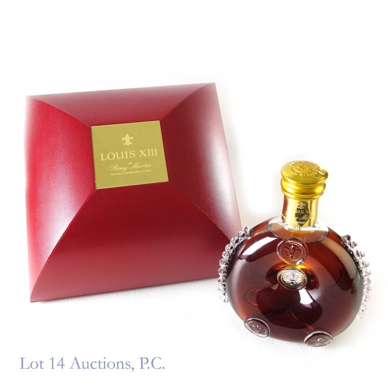 Remy Martin Louis XIII Grande Champagne Cognac: Remy Martin Louis XIII Grande Champagne Cognac Baccarat Decanter, 80 Proof, 750 ml, Bottle #1173. A reproduction of an original Renaissance model discovered in 1850 on the site of a 16th century battl