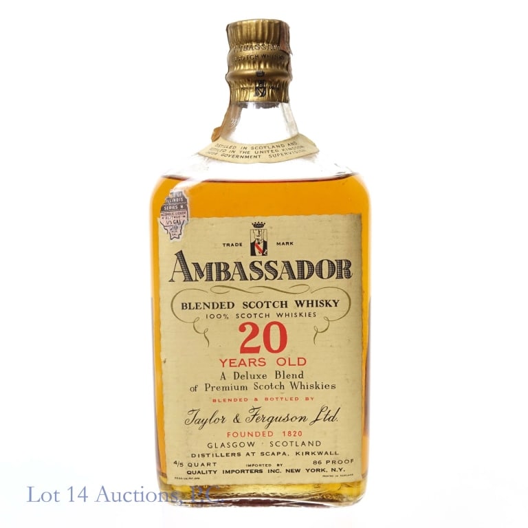 40s/60 Ambassador 20 Year Blended Scotch: Ambassador 20 Year Blended Scotch, 86 Proof, 4/5 Quart, early 1940s-1960 bottling. Tax strip badly worn and torn on both ends but capsule underneath remains sealed, Back label worn and peeling badly.