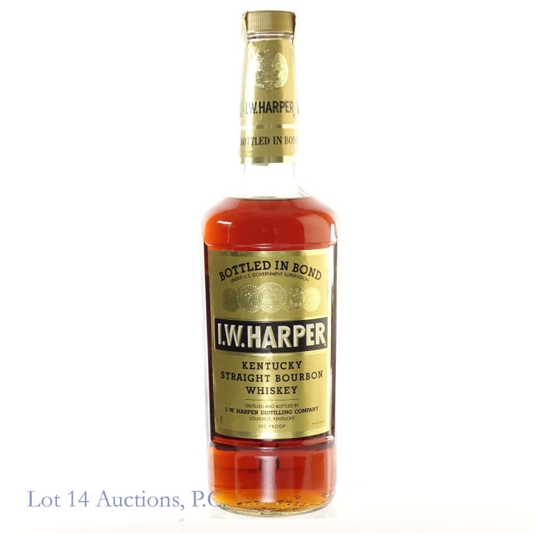 1975 I.W. Harper BIB Bourbon: I.W. Harper Bottled-In-Bond Bourbon, 100 Proof, 4/5 Quart, Bottled: Fall 1975, Made: Spring 1970. Small tears in tax strip but overall intact and in fair condition.