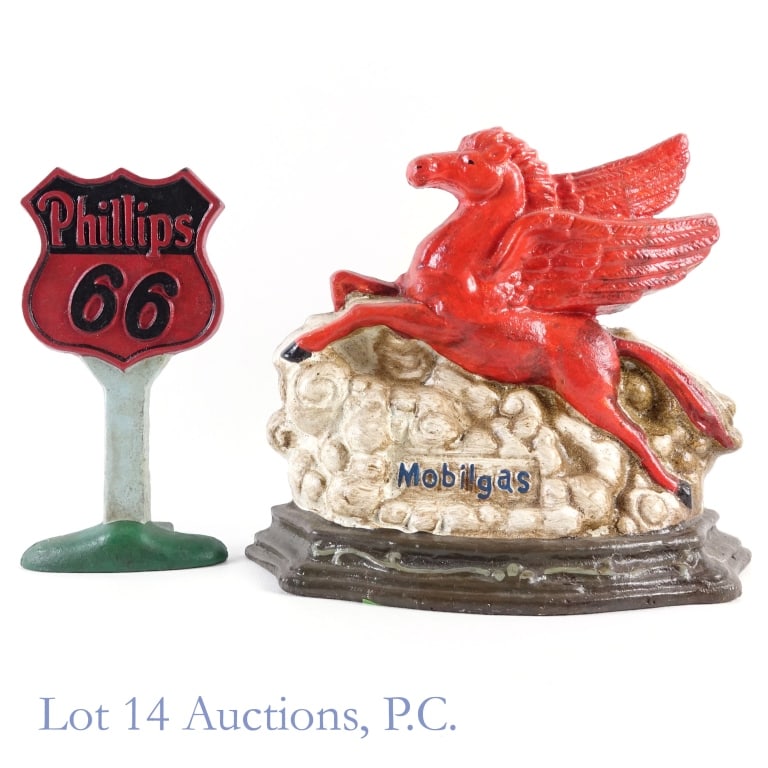 Mobil Gas & Phillips 66, Cast Iron Door Stops: Mobil Gas & Phillips 66, Cast Iron Door Stops. Mobil gas cast iron door stop. 11" x 12". 11 lb. Phillips 66 cast iron door stop. 9.5" x 5" x 3.5". 3 lb. Wear and tear and dirt and dust apparent. See p
