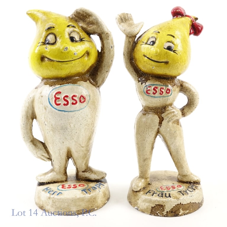 Esso Herr And Frau Tropf Cast Iron Banks: Herr Tropf and Frau Tropf cast iron banks. Both are marked M. Busch GmbH on the bottom. Both are approximately 9 inches tall and both have some sort of staining on them. We do not know what the staini