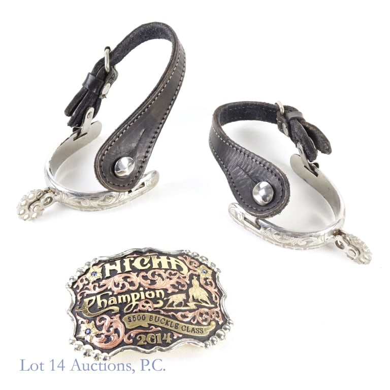 NICHA Champion Vaquero Belt Buckle, Spurs: NICHA Champion Vaquero Belt Buckle, Spurs. "NICHA Champion $500 Buckle Class 2014" belt buckle made by Vaquero 4.5"x3.25", will accept 1.75" belt. Some shine has been worn off the edges from wearing w