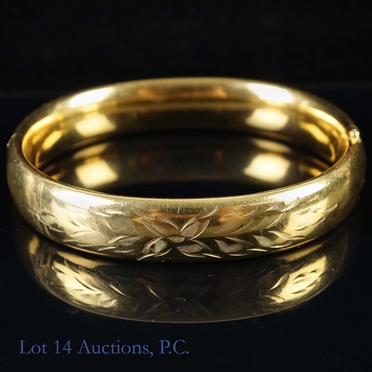 10k Y Gold Bracelet On Copper Core?: 10 karat yellow gold bracelet with inner core appearing to be copper or some other metal. No markings - tests 10 karat gold electronically and with our acid test. Inner dimensions approximately 1.25"