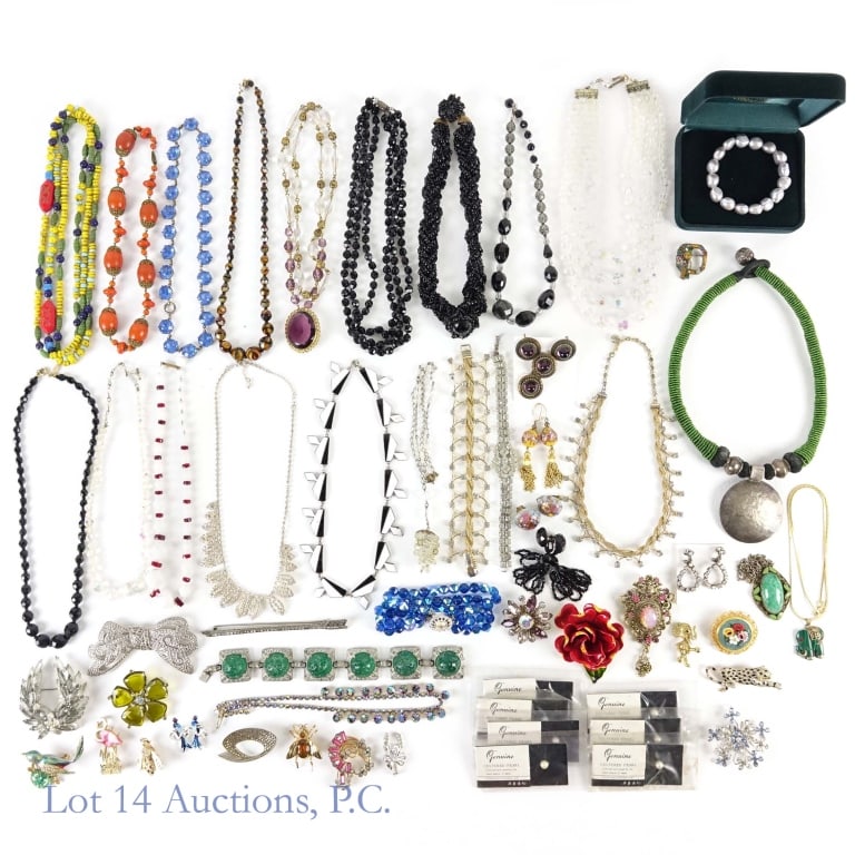 Estate Fashion / Costume Jewelry Collection: Collection of estate fashion or costume jewelry. Includes pins, necklaces, bracelets, earrings, etc. A few appear to be designer with names like "Monet", and "Sarah Coventry". Includes 7 cultured pear