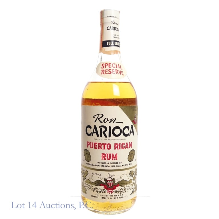 "68" Ron Carioca Puerto Rican Rum (1 Quart): Ron Carioca Special Reserve Puerto Rican Rum, 80 Proof, 1 Quart, early 1960s-late 1970s tax trip, "68" glass molding. Tax strip in good condition with little to no tears. Small tear and creasing on fr