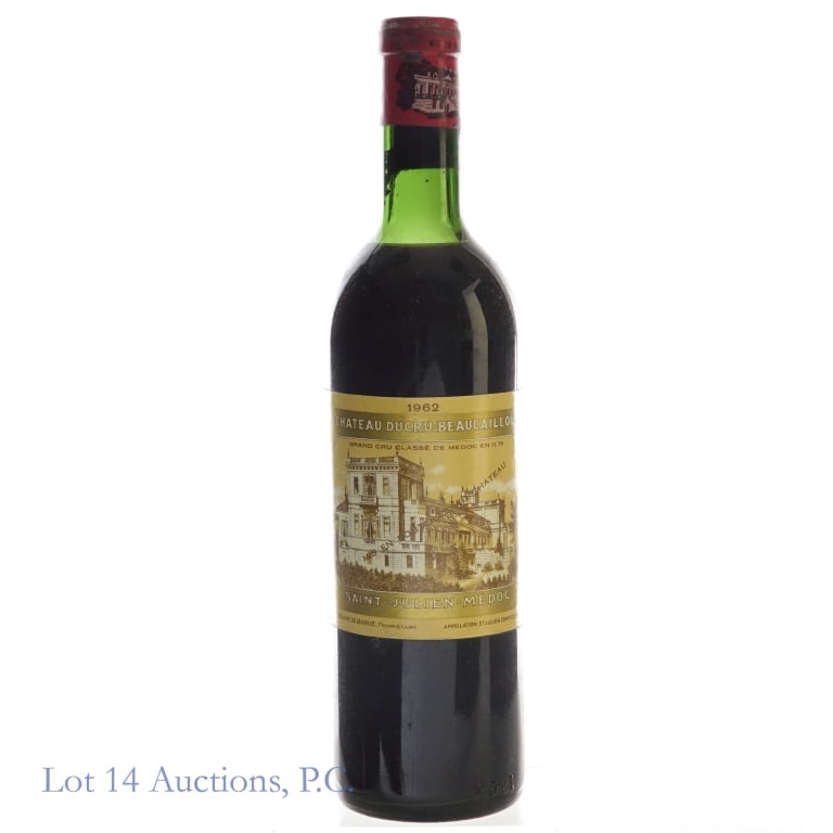 1962 Chateau Ducru-Beaucaillou Saint Julien: 1962 Chateau Ducru-Beaucaillou Saint Julien, %ABV: N/A, 750 ml, Vintage: 1962, Region: Bordeaux, France, Appellation, Pauillac, 2eme Grand Cru Classe. Severe sediment around neck of bottle and on bott