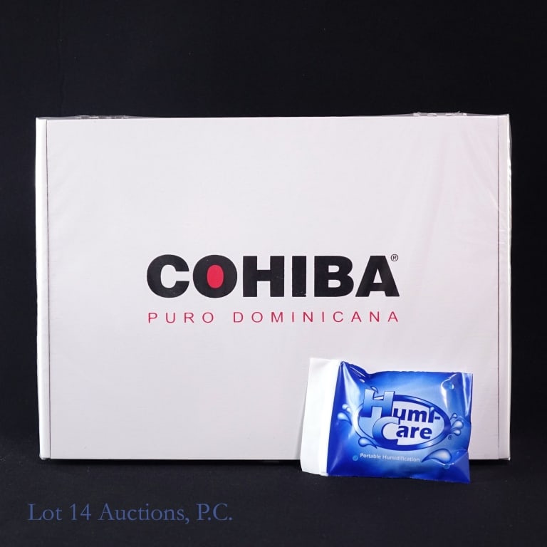 Cohiba Puro Dominicana Churchill Cigars (25 Pack): Cohiba Puro Dominicana Churchill Cigars, 7"x49, Pack of 25 sealed in wooden case. Wrapper: Habano, Origin: Dominican Republic.