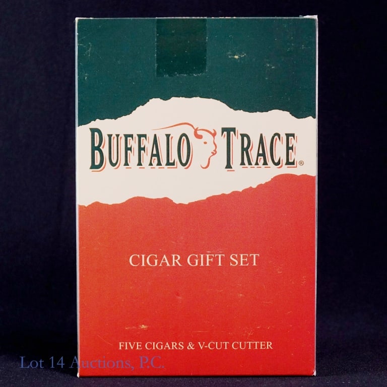 Buffalo Trace Cigar Gift Set: Buffalo Trace Cigar gift set includes 5-pack cigars and a v-cut cutter. Cigars are described as "Barrel aged Piloto Cubano and Nicaraguan long-filler tobaccos are encased inside a Brazilian Arapiraca