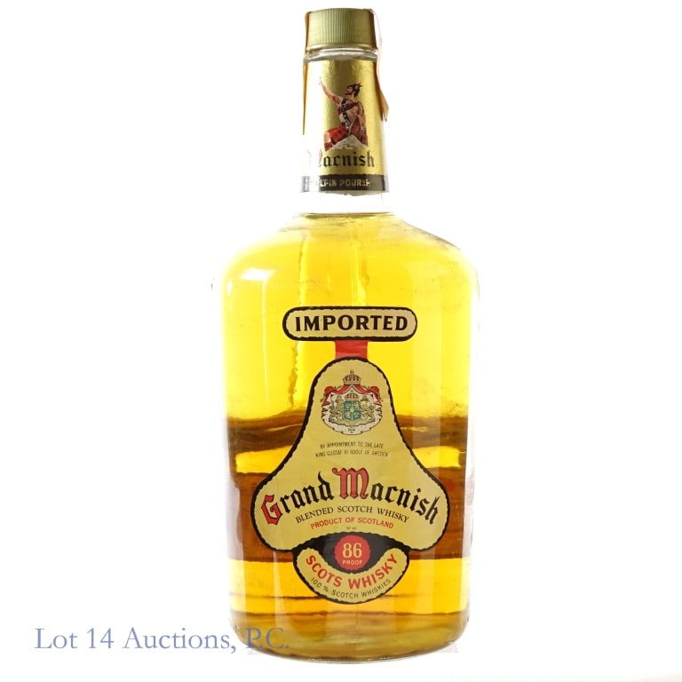1980s Grand Macnish Blended Scotch (1.75 Liters): Grand Macnish Blended Scotch, 86 Proof, 1.75 Liters, 1980s bottling. Label is slightly sun faded, staining and residue on tax strip but otherwise in fair condition with little tearing.