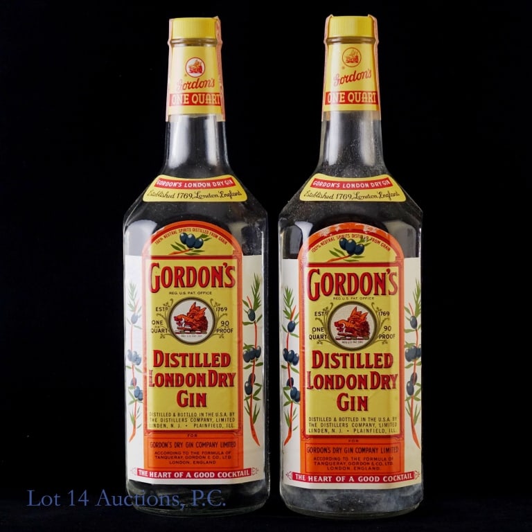 60s/70s Gordon's Distilled London Dry Gin 2, 1 Qt: 2 bottles total in this lot. Gordon's Distilled London Dry Gin, 90 Proof, 1 Quart, early 1960s- late 1970s bottling (x2). Small scuffs on tax strips and front labels but overall tax strips and labels 