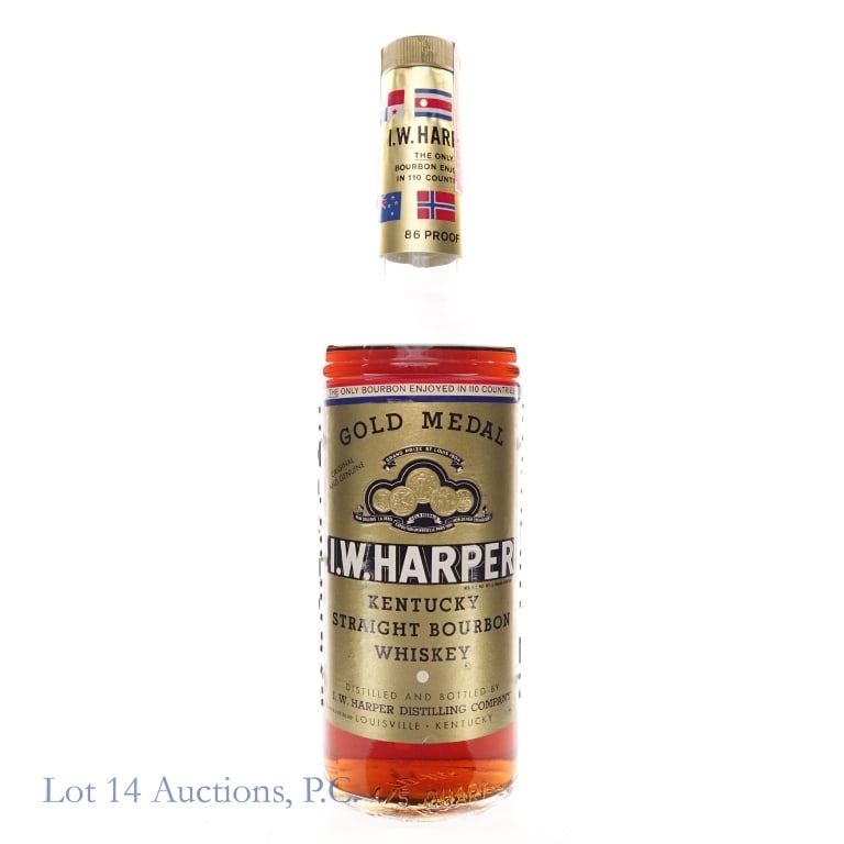 1960s I.W. Harper 6 Year Gold Medal Bourbon: I.W. Harper 6 Year Gold Medal Bourbon, 86 Proof, 4/5 Quart, early 1960s - late 1970s tax strip, "66" glass molding, Vintage label found in 1968 Bourbon Beverage Bar magazine ad. Low fill approximately