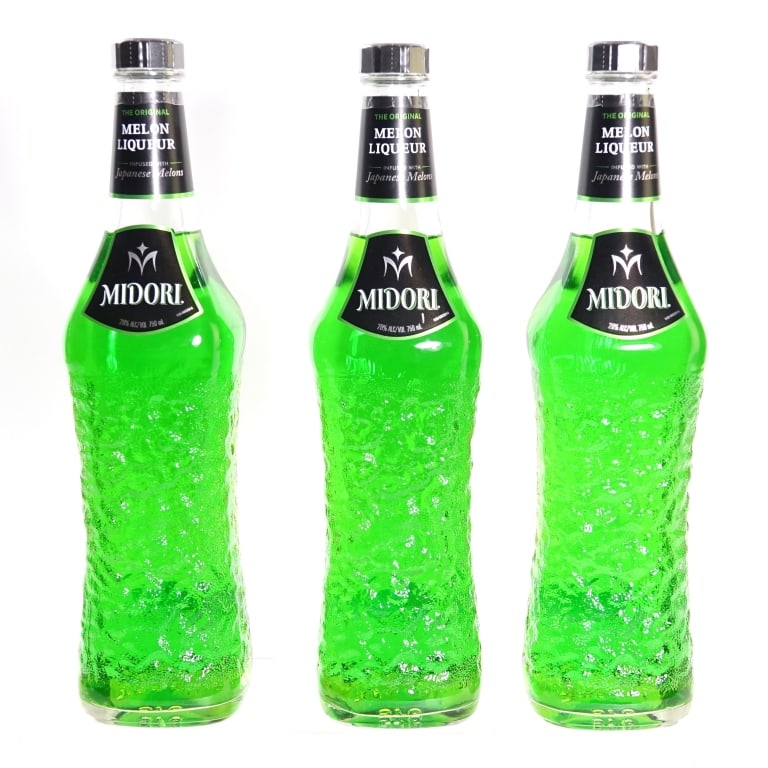 Midori Japanese Melon Liqueur (3): 3 bottles total in this lot. Midori Japanese Melon Liqueur, 20% ABV, 750 ml.