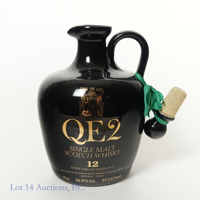 QE2 12 Year Single Malt Scotch Jug: QE2 12 Year Single Malt Scotch ceramic jug, 97 Proof, 750 ml, Feels full weighing approximately 3 Ib, 8.6 oz. Jug also includes custom stopper.