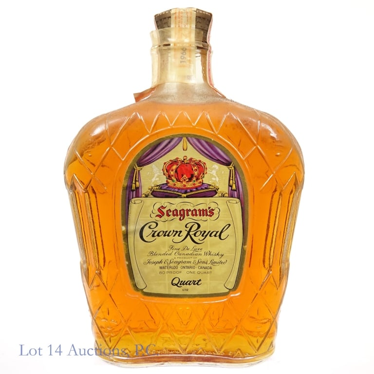 1966 Crown Royal Fine De Luxe Canadian Whisky 1 Qt: Crown Royal Fine De Luxe Canadian Whisky, 80 Proof, 1 Quart, Distilled: 1966. Tax strip in good condition with only minor tears. Box and bag NOT included.