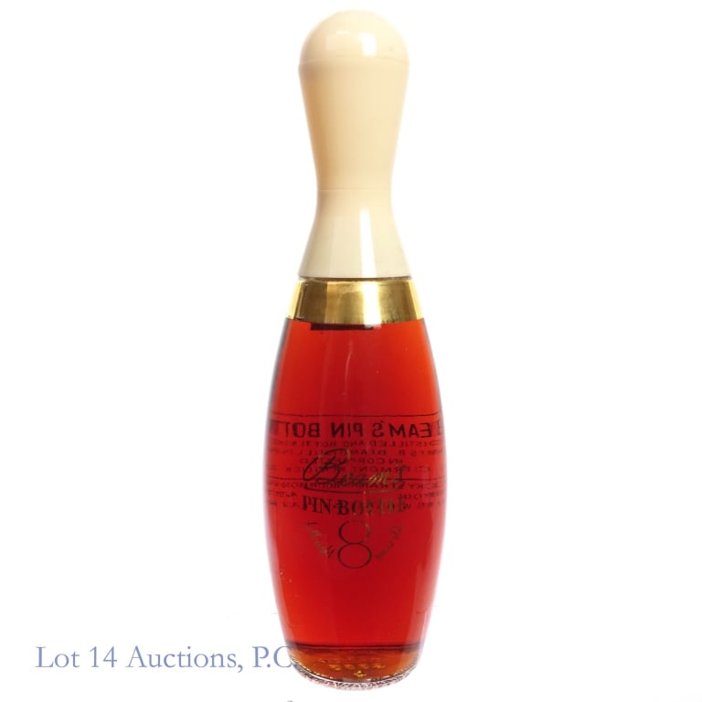 "55" Beam's 8 Year Pin Bottle Bourbon Decanter: Beam's 8 Year Pin Bottle Bourbon, 86.8 Proof, 4/5 Quart, early 1940s-1960 tax strip, "55" glass molding. Tax strip in good condition with little to no tears.