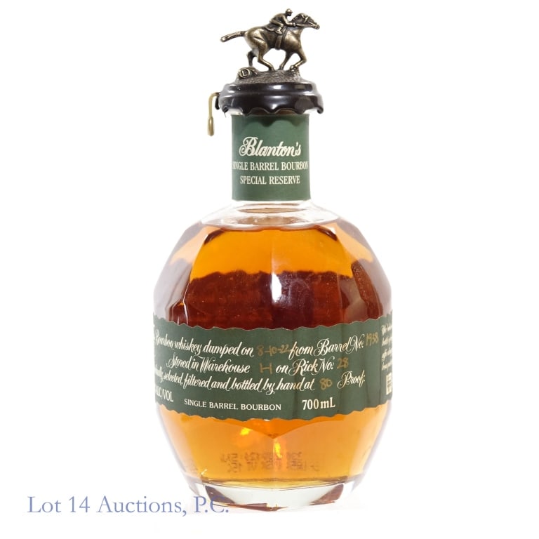Blanton's Green Label Single Barrel Bourbon "L"**: Blanton's Green Label Single Barrel Special Reserve Bourbon, 80 Proof, 700 ml, Letter L, Dump Date: 08-10-22, Barrel #1938, Bottle #21****Vertical crack in wax seal above plastic tab, label badly stai