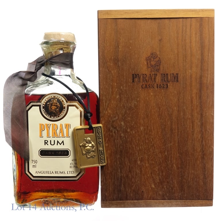 Pyrat Cask 1623 Rum: Pyrat Cask 1623 Rum, 80 Proof, 750 ml. Small tear in paper seal but plastic still intact. Wooden case included.