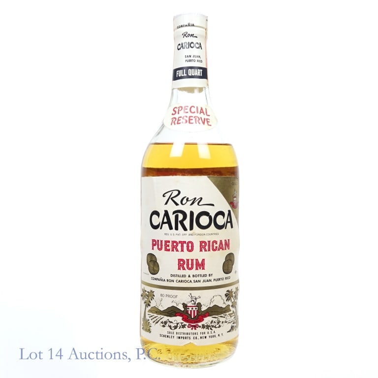 "68" Ron Carioca Puerto Rican Rum (1 Quart): Ron Carioca Special Reserve Puerto Rican Rum, 80 Proof, 1 Quart, early 1960s-late 1970s tax trip, "68" glass molding. Tax strip has small tear but otherwise in good condition. Slight staining and smal