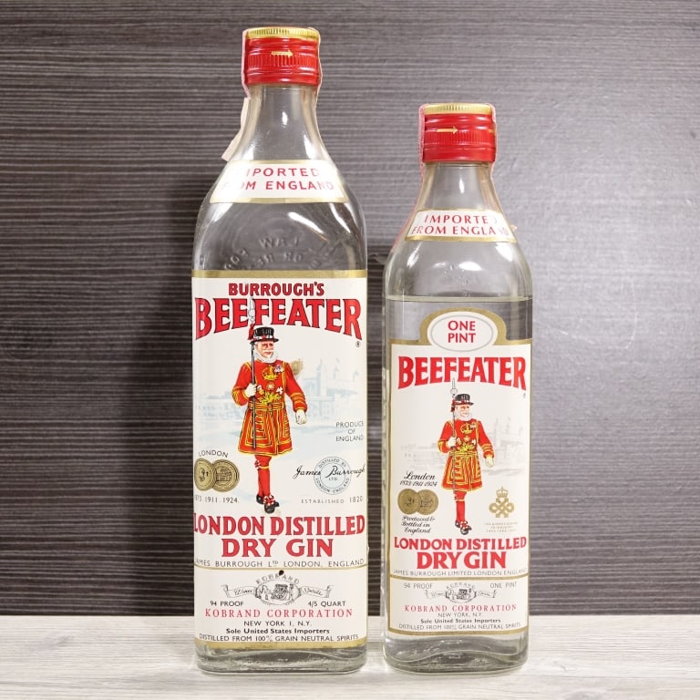60s/70s Beefeater London Distilled Dry Gin (2): 2 bottles total in this lot. 1-Beefeater London Distilled Dry Gin, 94 Proof, 4/5 Quart, early 1960s-late 1970s. Tax strip torn in multiple places but intact overall. 2-Beefeater London Distilled Dry G