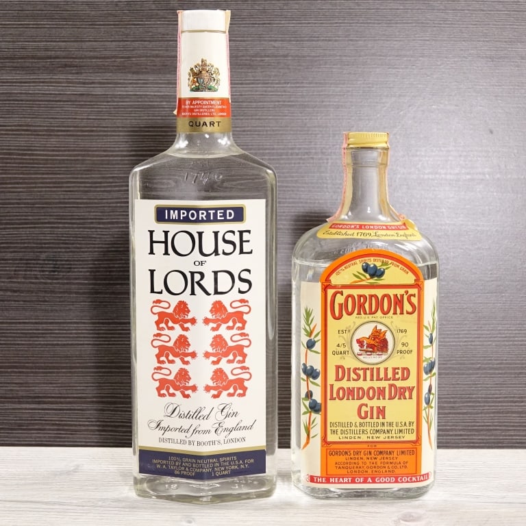 60s/70s Gordon's & House of Lords Gin (2): 2 bottles total in this lot. 1-Gordon's Distilled London Dry Gin, 90 Proof, 4/5 Quart early 1960s-late 1970s bottling, tax strip in fair condition with slight peeling and minor nicks. Low fill, approx