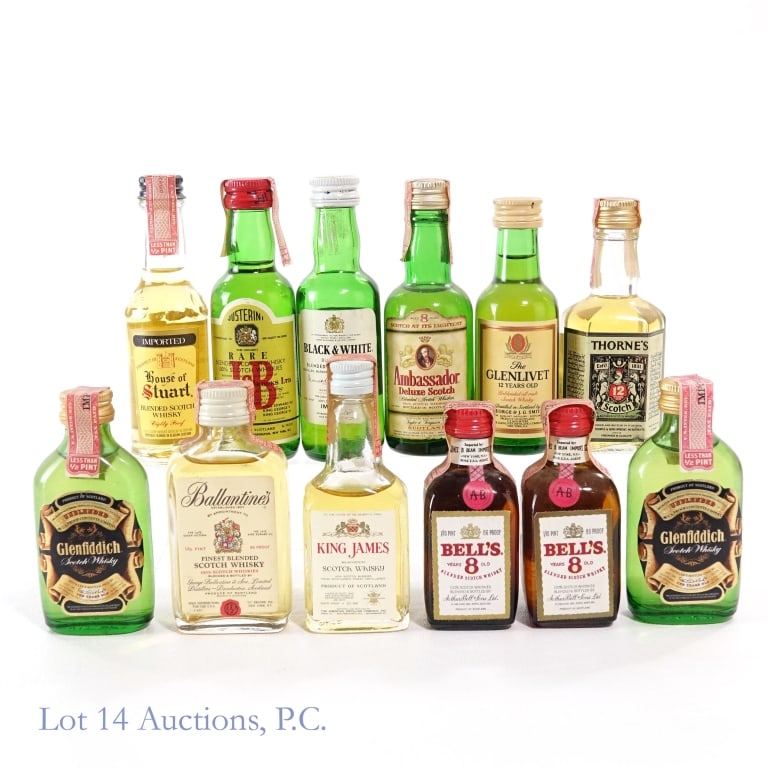 Glenfiddich 10 Yr, Ballantines, & More Minis (12): 12 minis total in this lot. 1-Glenlivet 12 Year Unblended All Malt Scotch Mini, 86 Proof, 50 ml, 2-Ambassador Deluxe 8 Year Blended Scotch Mini, 86 Proof, 1/10 Pint, early 1940s-1960 tax strip, 3-Thor