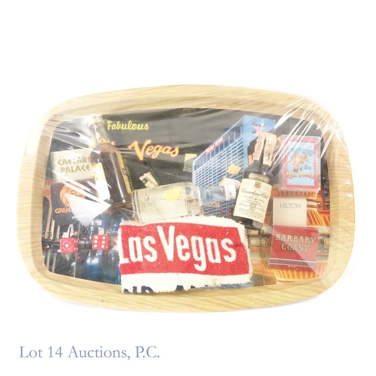 Las Vegas Tray with IW Harper & Other Minis (3): Las Vegas welcome tray holding 4 matchbooks from Caesar's Palace, MGM Grand Hotel, Hilton, and Barbary Coast. It also includes 2 dice, a Las Vegas souvenir towel, and a "I lost my ** in Las Vegas" min