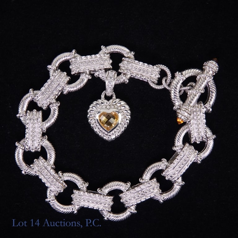 Judith Ripka Sterling Silver & CZ Bracelet: Judith Ripka Sterling Silver & CZ Bracelet. Marked "925" and "CZ". Total weight: 55.1 grams.